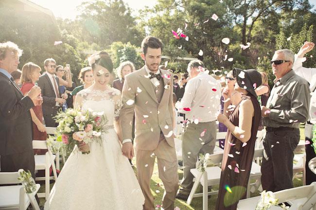 Outdoor Wedding, Petals being thrown as couple walk down the aisle