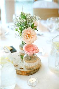 Flowers. 2 Small Mason jars with Roses on a wooden base