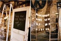 Escort cards hanging between ladders