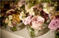 Beautiful flowers in mix n match glass vases