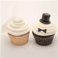 Cakes. Love these bride and groom cupcakes with little top hats and veils.