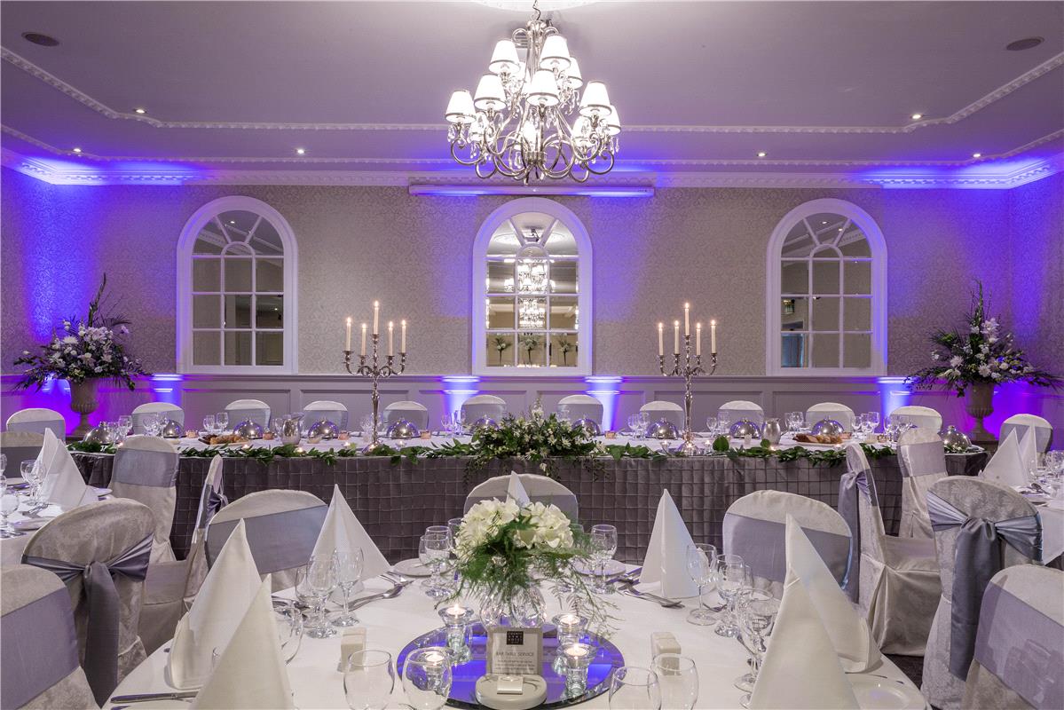 Table Settings, Top Table under Mirror top of room suitable for smaller Wedding less than 200
